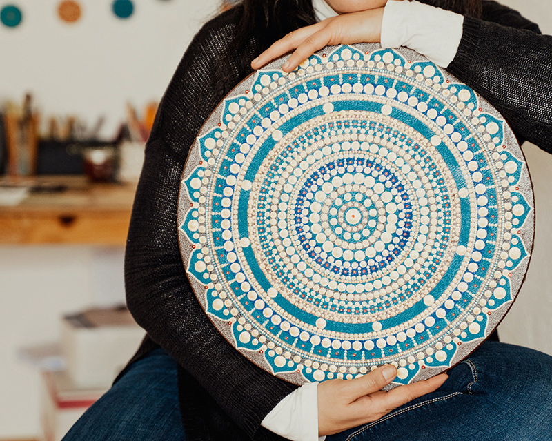 mari_assessment_rochester_ny Person holding a mandala that they made during a MARI assessment in Rochester, NY